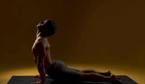 man-practicing-yoga-pose